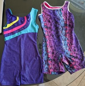 3 girls gymnastics biketards